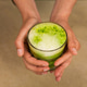 Female hands holding a detox juice Female hands holding a detox juice - PhotoDune Item for Sale