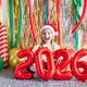 Smiling young girl in Santa hat holding 2026 balloons at festive decorated room Smiling young girl in Santa hat holding 2026 balloons at festive decorated room - PhotoDune Item for Sale
