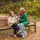 Sitting mother with daughter on park bench. Family talk, smile supports love, care, trust. Outdoor Sitting mother with daughter on park bench. Family talk, smile supports love, care, trust. Outdoor - PhotoDune Item for Sale