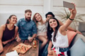Happy and joyful young people taking selfie at party Happy and joyful young people taking selfie at party - PhotoDune Item for Sale