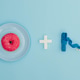A donut with sugar on a blue background. A donut with sugar on a blue background. - PhotoDune Item for Sale