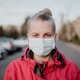 Portrait of Woman Wearing Protective Mask Against Covid-19 Outdoors Portrait of Woman Wearing Protective Mask Against Covid-19 Outdoors - PhotoDune Item for Sale