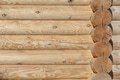 New wooden wall. Rough surface of the log. New wooden wall. Rough surface of the log. - PhotoDune Item for Sale