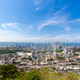 Flag wavering in front of scenic view of Cartagena modern skyline Flag wavering in front of scenic view of Cartagena modern skyline - PhotoDune Item for Sale