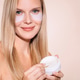 Woman applying skincare product with under-eye patches, showcasing a beauty routine Woman applying skincare product with under-eye patches, showcasing a beauty routine - PhotoDune Item for Sale