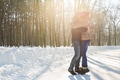 Happy Young Couple in Winter Park having fun. Family Outdoors. love Happy Young Couple in Winter Park having fun. Family Outdoors. love - PhotoDune Item for Sale