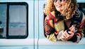 Cheerful close up portrait beautiful caucasian woman out of the van window during travel vacation Cheerful close up portrait beautiful caucasian woman out of the van window during travel vacation - PhotoDune Item for Sale