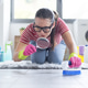 Obsessed woman cleaning the bathroom floor at home Obsessed woman cleaning the bathroom floor at home - PhotoDune Item for Sale