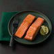 Cooked salmon fllets on green background Cooked salmon fllets on green background - PhotoDune Item for Sale