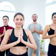 Group of individuals practicing yoga together in a bright studio setting Group of individuals practicing yoga together in a bright studio setting - PhotoDune Item for Sale