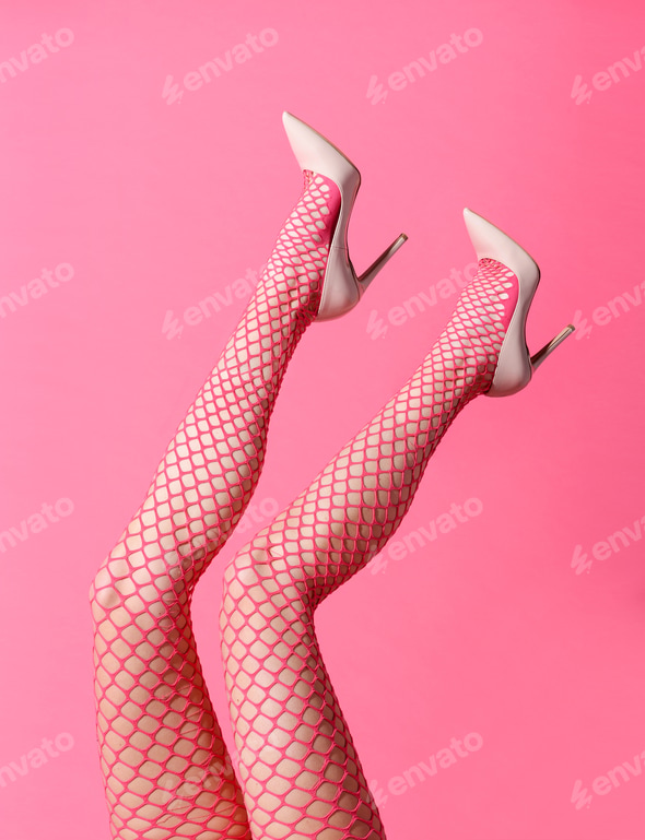 Slender woman wearing sexy pink fishnet stockings and stilettos Stock Photo by Photology75 Slender woman wearing sexy pink fishnet stockings and stilettos Stock Photo by Photology75