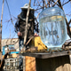 Honey bees carrying water for making honey with an old man on background. Beekeepers of Ukraine Honey bees carrying water for making honey with an old man on background. Beekeepers of Ukraine - PhotoDune Item for Sale