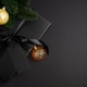 Black Christmas Gift Box with Satin Ribbon and Golden Ornaments on Dark Holiday Background Black Christmas Gift Box with Satin Ribbon and Golden Ornaments on Dark Holiday Background - PhotoDune Item for Sale
