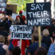 Say Their Names: Image of protesters from behind holding signs at a Black Lives Matter rally. Say Their Names: Image of protesters from behind holding signs at a Black Lives Matter rally. - PhotoDune Item for Sale