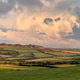 Thunder clouds over the countryside of Anglesey in north Wales Thunder clouds over the countryside of Anglesey in north Wales - PhotoDune Item for Sale