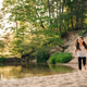 Happy little girl running on sandy beach close to river. Junior active athlete doing sports Happy little girl running on sandy beach close to river. Junior active athlete doing sports - PhotoDune Item for Sale