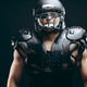 Portrait of american football player in protective shields on naked torso Portrait of american football player in protective shields on naked torso - PhotoDune Item for Sale