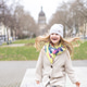 a happy little girl with long hair in a coat walks around an old European city a happy little girl with long hair in a coat walks around an old European city - PhotoDune Item for Sale