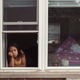 diverse child at home looking out window, lonely bored and sad diverse child at home looking out window, lonely bored and sad - PhotoDune Item for Sale
