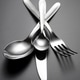 Fork, knife and spoons on table Fork, knife and spoons on table - PhotoDune Item for Sale