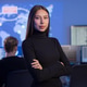 Confident Female Analyst Posing in a Cybersecurity Operation Center Confident Female Analyst Posing in a Cybersecurity Operation Center - PhotoDune Item for Sale