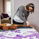 Musician tuning acoustic guitar on bed in bedroom Musician tuning acoustic guitar on bed in bedroom - PhotoDune Item for Sale