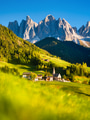 Santa Maddalena. Val di Funes. Dolomite Alps. Italy. The mountains and the forest before sunset. Santa Maddalena. Val di Funes. Dolomite Alps. Italy. The mountains and the forest before sunset. - PhotoDune Item for Sale