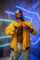 Black rapper in underpass neon light on background Black rapper in underpass neon light on background - PhotoDune Item for Sale