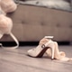 Female underwear thrown on the floor with a high heeled shoes in a white room near the bed. Female underwear thrown on the floor with a high heeled shoes in a white room near the bed. - PhotoDune Item for Sale