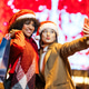 Diverse women friends taking selfie during christmas shopping Diverse women friends taking selfie during christmas shopping - PhotoDune Item for Sale