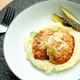 Chicken patties served with mashed potatoes and pickled cucumber on white plate Chicken patties served with mashed potatoes and pickled cucumber on white plate - PhotoDune Item for Sale
