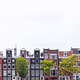 View of an Amsterdam street with canal. View of an Amsterdam street with canal. - PhotoDune Item for Sale