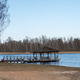 Relaxing lakeside view with a wooden gazebo in Valdemarpils Latvia Relaxing lakeside view with a wooden gazebo in Valdemarpils Latvia - PhotoDune Item for Sale