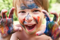 Portrait Of Boy With Painted Face and Hands Portrait Of Boy With Painted Face and Hands - PhotoDune Item for Sale