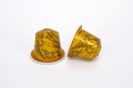 Gold colour coffee capsules Gold colour coffee capsules - PhotoDune Item for Sale