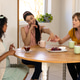 Women enjoying tea and conversation at home, sharing laughter and friendship Women enjoying tea and conversation at home, sharing laughter and friendship - PhotoDune Item for Sale