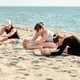 Adult women practicing group yoga stretching on Baltic Sea sandy beach Adult women practicing group yoga stretching on Baltic Sea sandy beach - PhotoDune Item for Sale