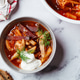 Classic homemade borscht with chicken in a grey bowl. Classic homemade borscht with chicken in a grey bowl. - PhotoDune Item for Sale