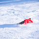 Man falling while snowboarding on a mountain Man falling while snowboarding on a mountain - PhotoDune Item for Sale