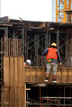 Construction workers fabricating steel reinforcement bar at the construction site Construction workers fabricating steel reinforcement bar at the construction site - PhotoDune Item for Sale