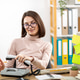 Smiling Woman at Retro Office Desk Talking on Landline Phone Smiling Woman at Retro Office Desk Talking on Landline Phone - PhotoDune Item for Sale
