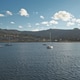 Regatta on luxury yachts aerial. Sail boats cruise at ocean bay in Brodick harbor, Scotland, Europe Regatta on luxury yachts aerial. Sail boats cruise at ocean bay in Brodick harbor, Scotland, Europe - PhotoDune Item for Sale