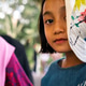 Portrait of a little Malay Asian girl smiling with dimple in outdoor. Portrait of a little Malay Asian girl smiling with dimple in outdoor. - PhotoDune Item for Sale