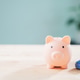 Piggy bank beside blue toy car shows auto finance insurance money loan cost to save credit, Piggy bank beside blue toy car shows auto finance insurance money loan cost to save credit, - PhotoDune Item for Sale
