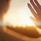 Woman catching solar energy with her hands. Warm rays of the setting sun in summer. Woman catching solar energy with her hands. Warm rays of the setting sun in summer. - PhotoDune Item for Sale