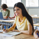 Portrait of teenager female student writing notes during class at high school Portrait of teenager female student writing notes during class at high school - PhotoDune Item for Sale