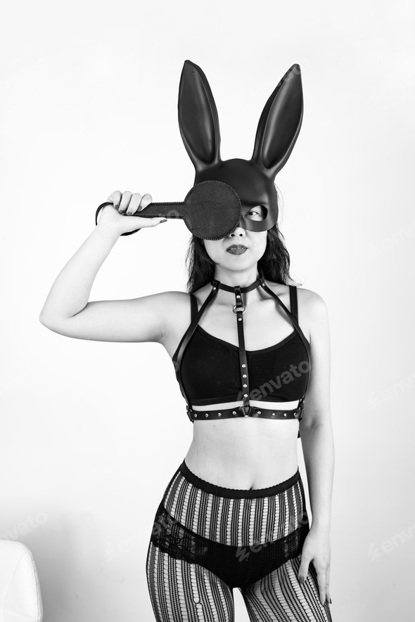 Portrait of young beautiful sexy woman with sex toys. Model wearing bdsm black mask of Easter bunny Stock Photo by nikolast1 Portrait of young beautiful sexy woman with sex toys. Model wearing bdsm black mask of Easter bunny Stock Photo by nikolast1
