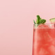 Refreshing watermelon mocktail with mint and ice stands on soft pink background Refreshing watermelon mocktail with mint and ice stands on soft pink background - PhotoDune Item for Sale