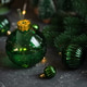 Green Ornament-Shaped Christmas Cup for Cocktail with Straw and Festive Decor Green Ornament-Shaped Christmas Cup for Cocktail with Straw and Festive Decor - PhotoDune Item for Sale