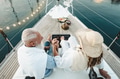 Senior couple celebrating wedding anniversary on sailboat Senior couple celebrating wedding anniversary on sailboat - PhotoDune Item for Sale
